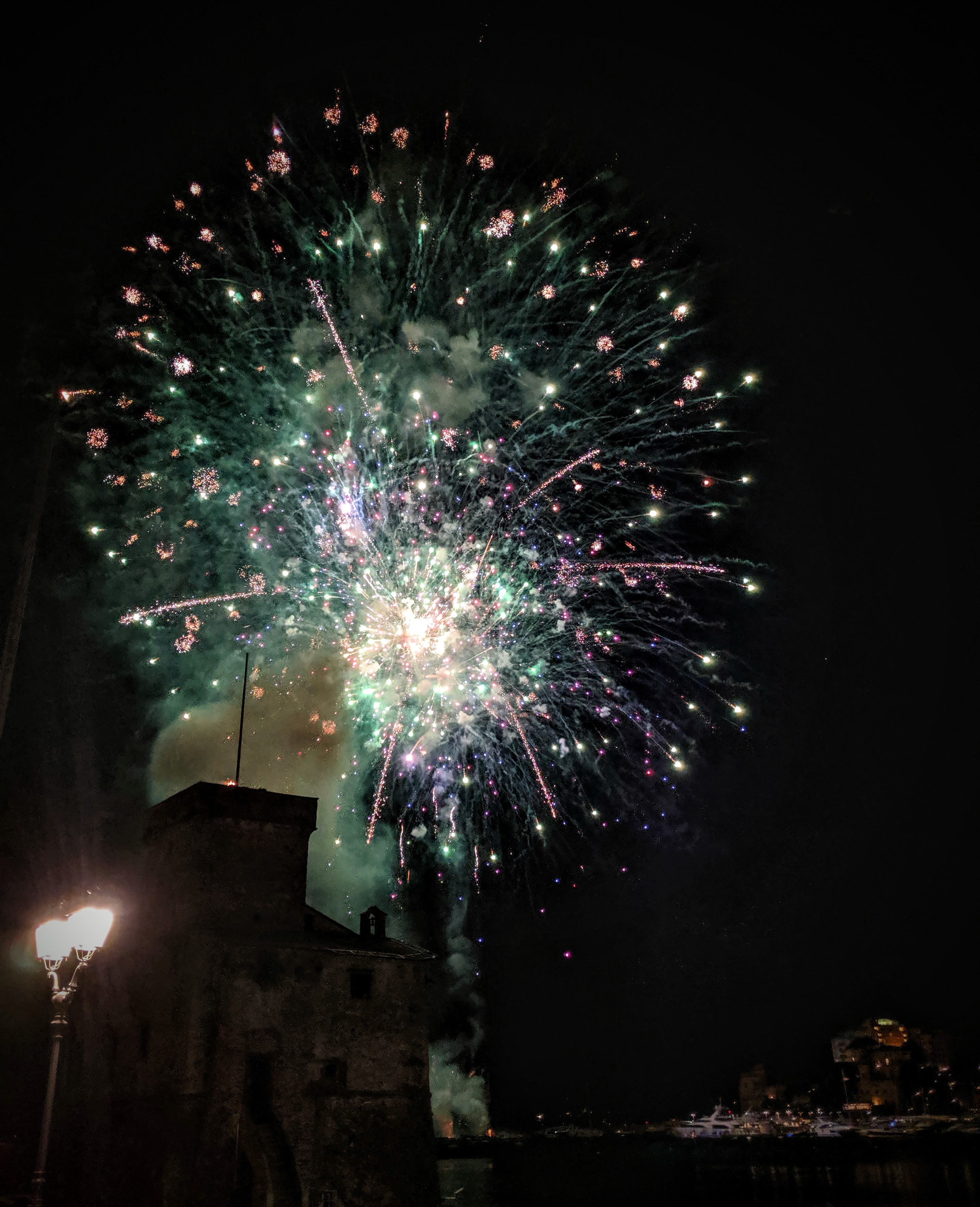 Fireworks with the Rapallo castle in the foreground. 